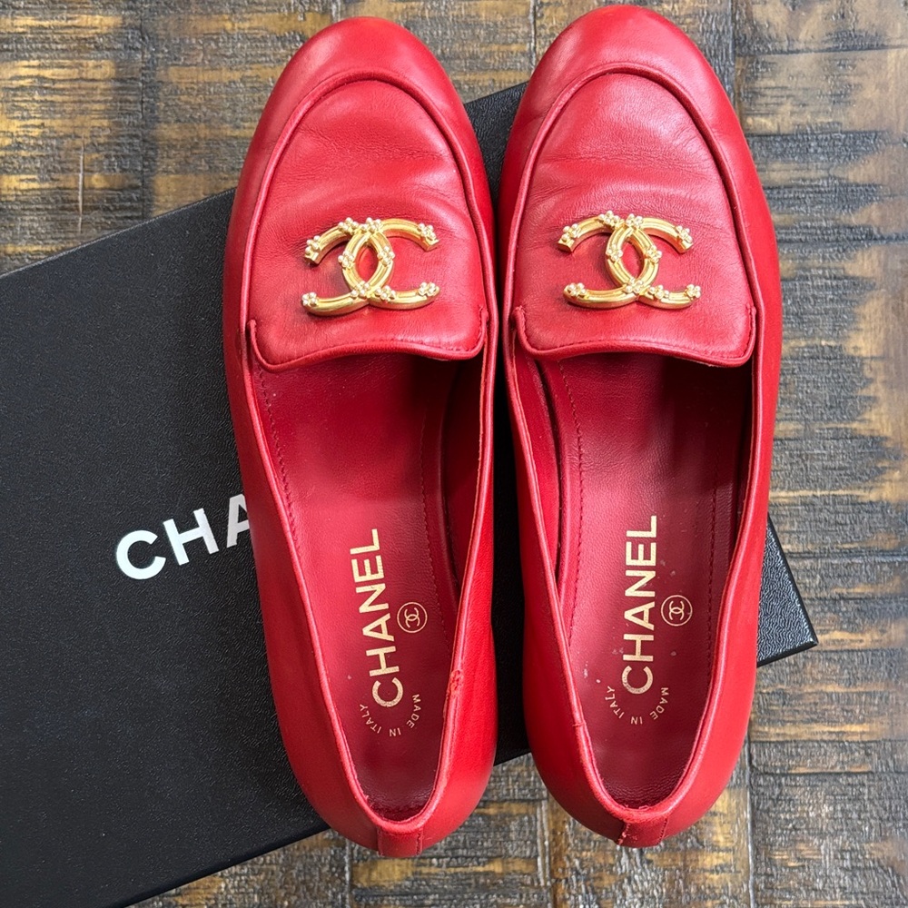 CHANEL Ruby Red Slipper Leather Flats with Gold Accents. Dorothy Would Be Proud!